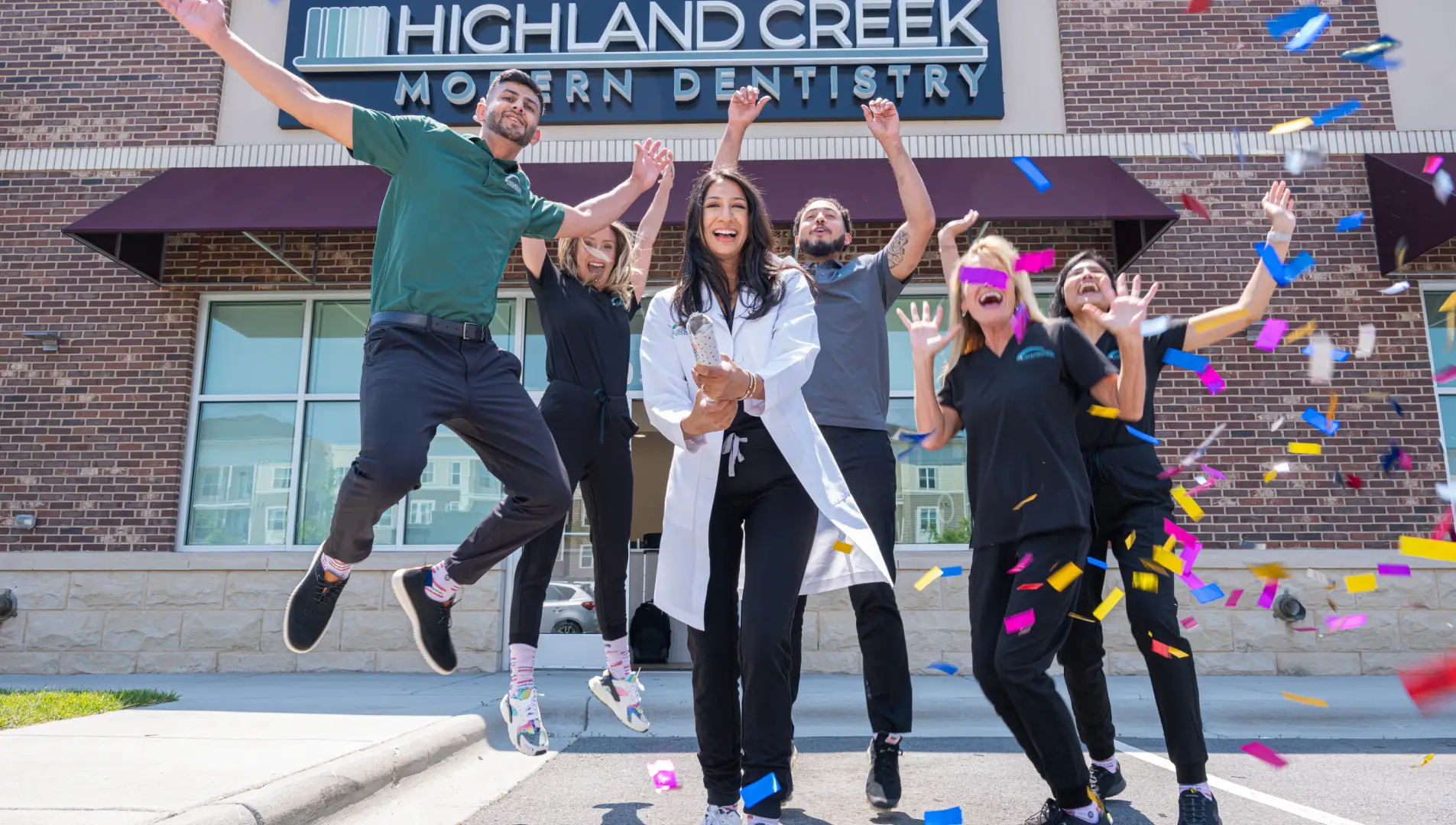 Higland Creek Modern Dentistry team celebrating